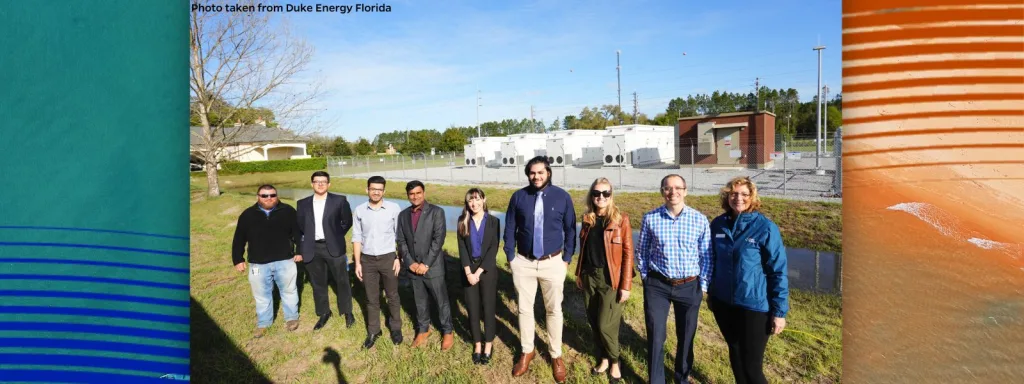 Professor Jonathan Scheffe, Melissa Seixas, president of Duke Energy Florida, and student awardees of the Duke Energy scholarships posing together at UF Energy Park.