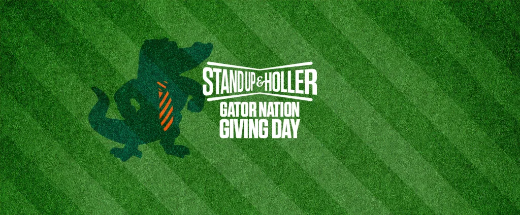 Giving Day banner, featuring AstroTurf background and the signature Gator silhouette with the 2-bits tie next to the logo: "Stand Up & Holler Gator Nation Giving Day"