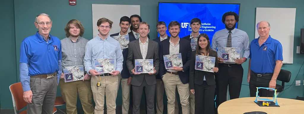 Senior design students with NASA engineers