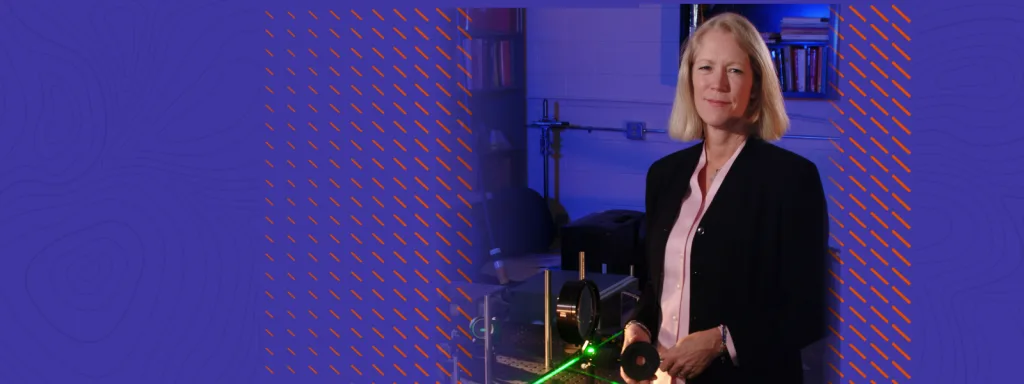 Abstract orange and blue background with an image of Jill Peterson incorporated, shown working in her lab.