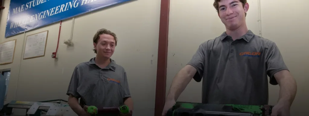 Two students working on their robot
