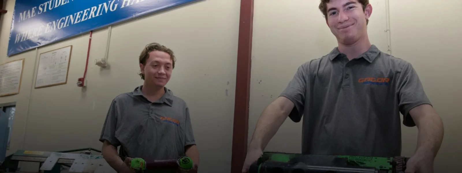 Two students working on their robot