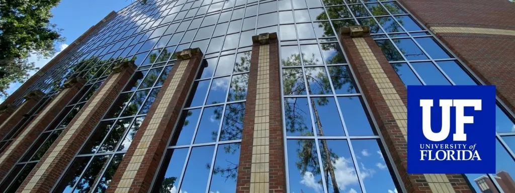 Skewed image of New Engineering Building at the University of Florida with UF logo.